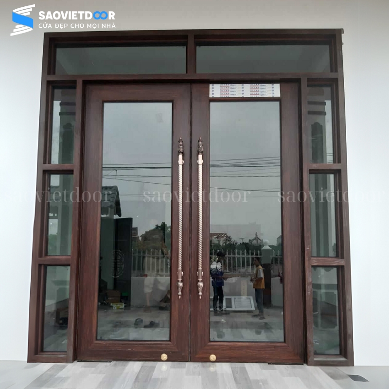 Cửa nhôm thuỷ lực vân gỗ trắc 