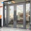 Cửa nhôm thuỷ lực màu ghi xám